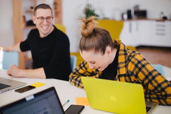 students laughing (c) unsplash